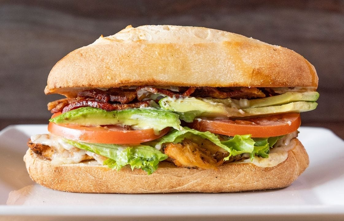 Grilled Chicken Avocado Club Sandwich.