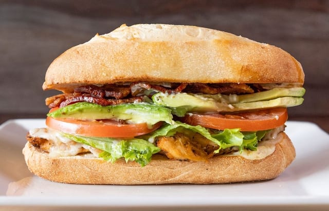 Grilled Chicken Avocado Club Sandwich.